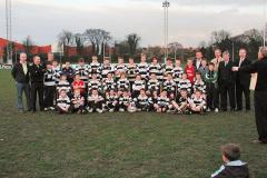 Well-known-minis-players-Dan-Leavy-pictured-in-his-OBRFC-gear-far-right-middle-row